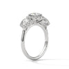 2.53 CT Round Cut Lab-Grown Diamond Three Stone Halo Ring with Pavé Accents